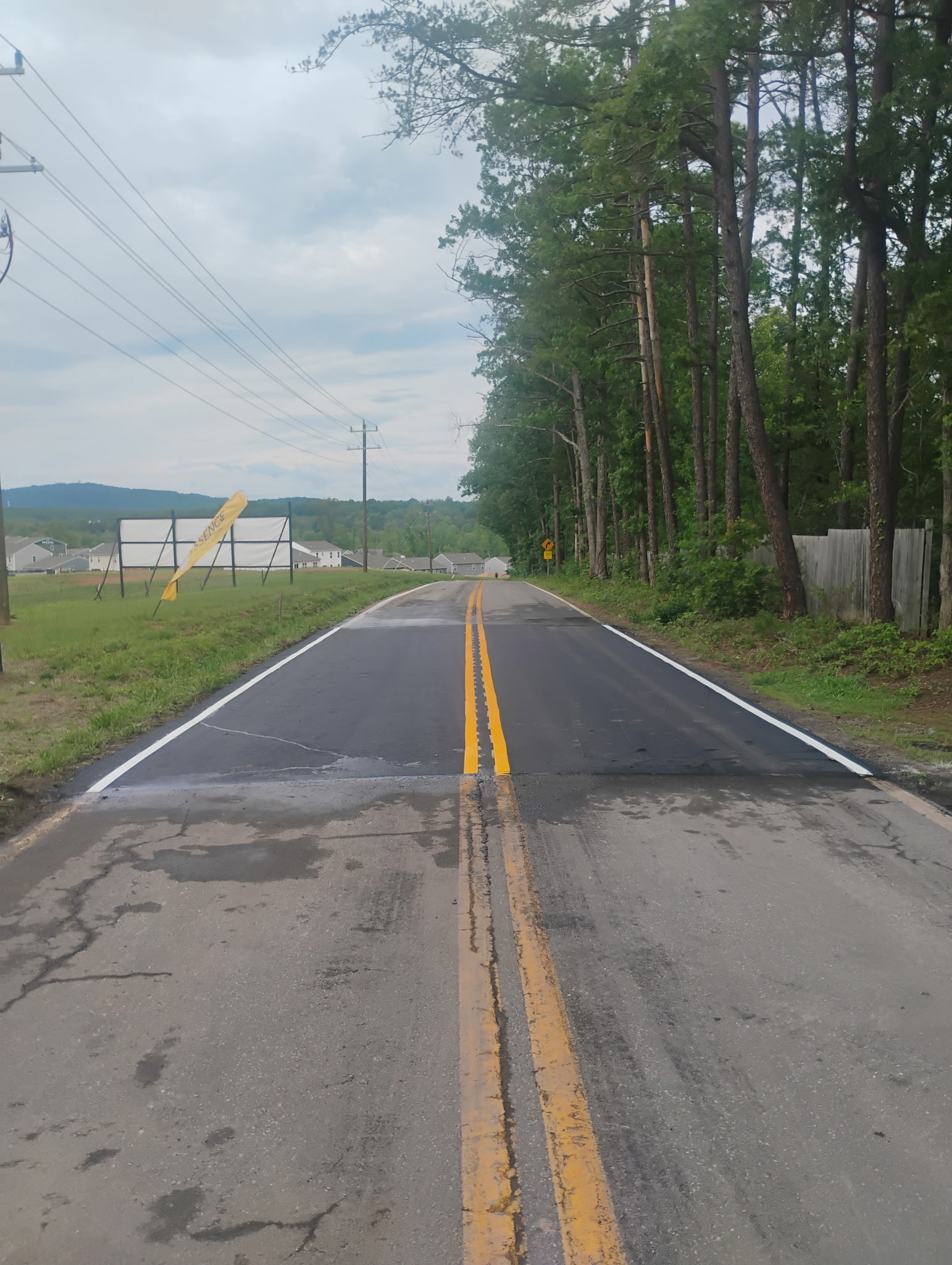 Roadway patch and striping